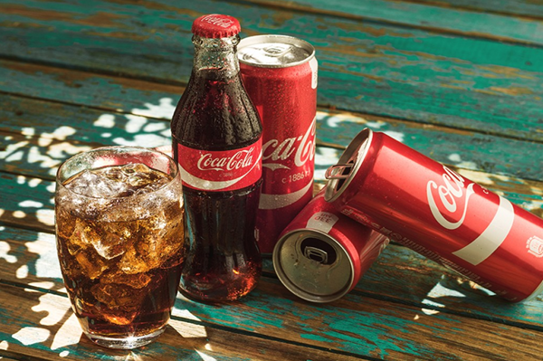 La Historia de Coca Cola